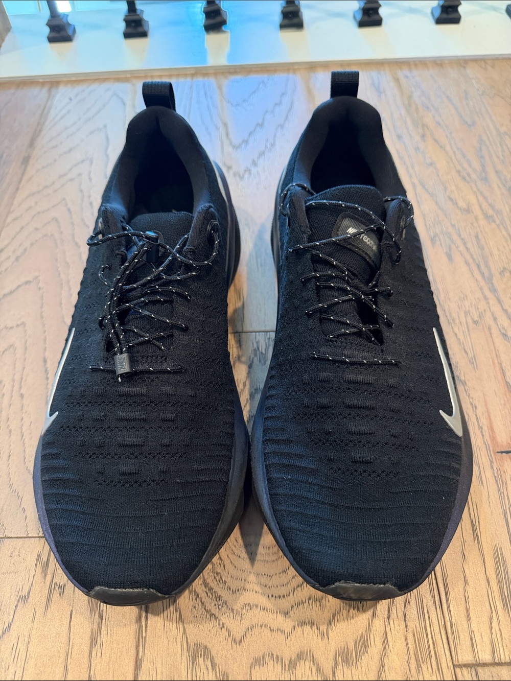 Nike Black Knit Athletic Sneakers with White Swoosh